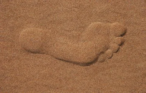 Footstep in the beach Stock Photos