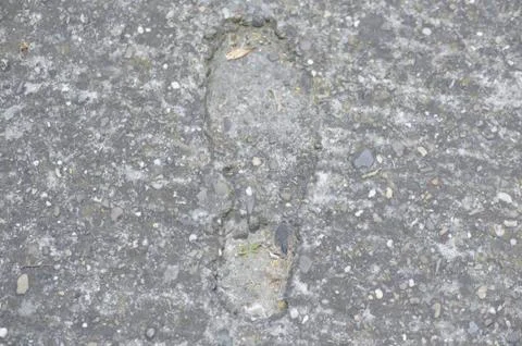 Footstep on Cement Texture Stock Photos