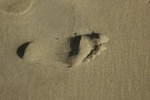 Footstep in the sand Stock Photos