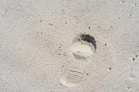 Footstep walking on sand Stock Photos