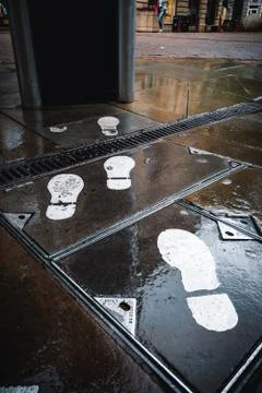 Footsteps in the rain Stock Photos