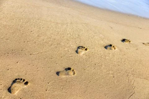 Footsteps on the sand Foto stock