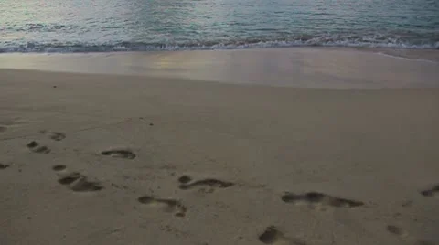 Footsteps at the sea beach Stock Footage 8927243