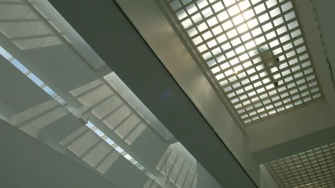 Footsteps seen from below on glass corridor towards better future Stock Footage 129268073