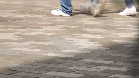 Footsteps on sidewalk timelapse 库存影片 20587227