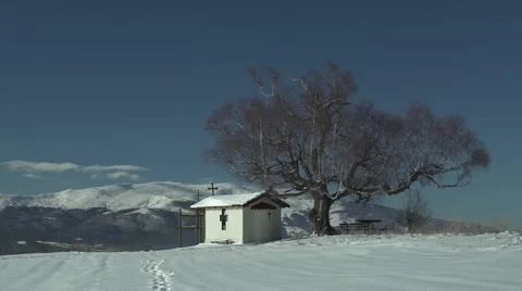 Footsteps in the Snow Mountain Church 4K Stock Footage 59771765