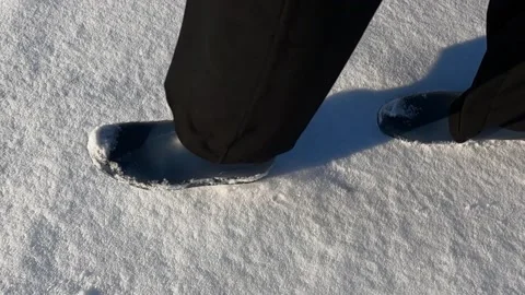 Footsteps in the snow. On a winter day. Stock Footage 148325352