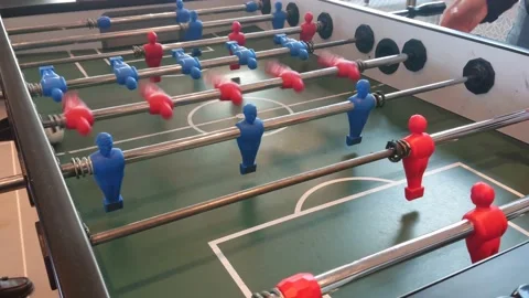Foottage of people playing soccer table or Foosball game Stock Footage 178490352