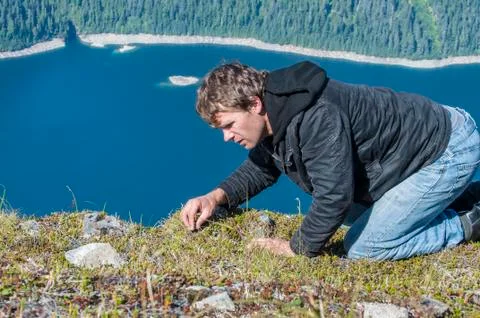 Foraging man Stock Photos