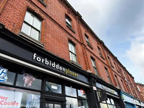 Forbidden Planet comic book store storefront on red brick building in Dubli.. Stock Photos