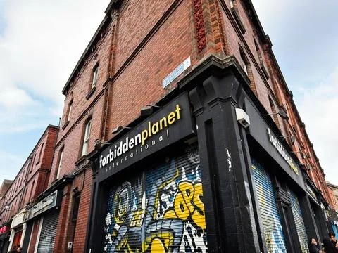 Forbidden Planet comic shop on a red brick corner building in Dublin, Irela.. Stock Photos