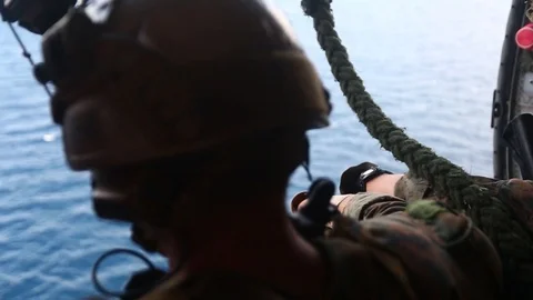 Force Reconnaissance Marines rope out of an MH-60S Seahawk - 2018 Stock Footage 93137901