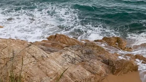 The force of the sea against the rocks Stock Footage 308470895