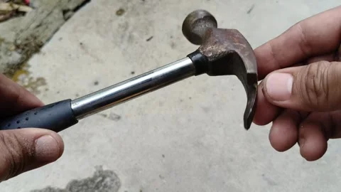 "Force of Strength: Iron Hammer with Broken Nails" Stock Footage 298526004