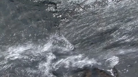 The force of the water of a stream Stock Footage 52063218