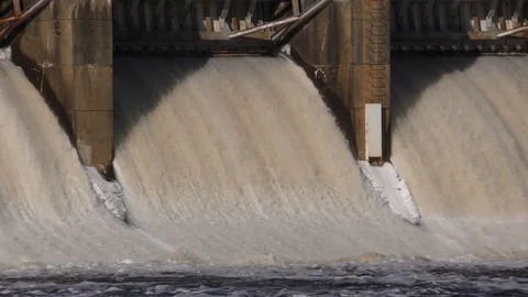 Forced Water Rushing Through a Dam Stock Footage 95198656
