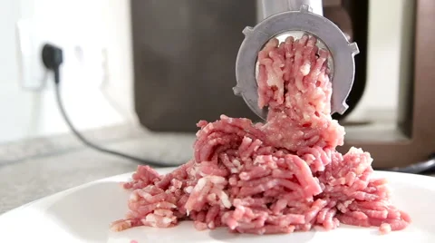 Forcemeat preparation in an electric meat grinder. Stock Footage 61926108