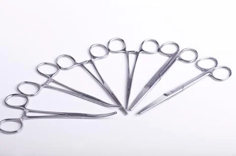 Forceps and surgical scissors Stock Photos