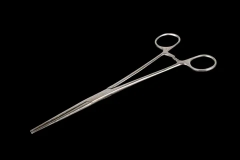 Forceps isolated on a black background Stock Photos