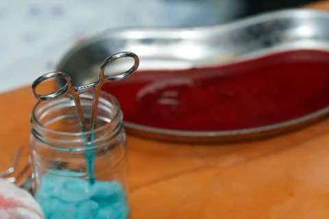 Forceps in the jar Stockfoto's