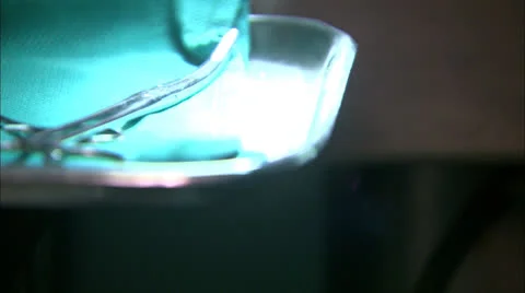 Forceps on Surgeon's Tray- Extreme Close Up HD Video Stock Footage 22686354