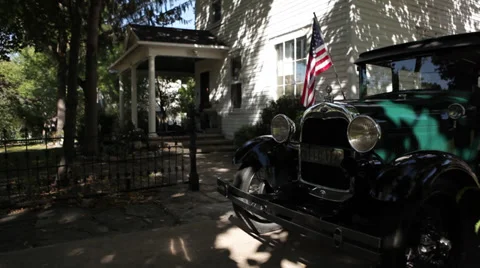 Ford Model A 1929 Flag WS LR Pan Stock Footage 30581004