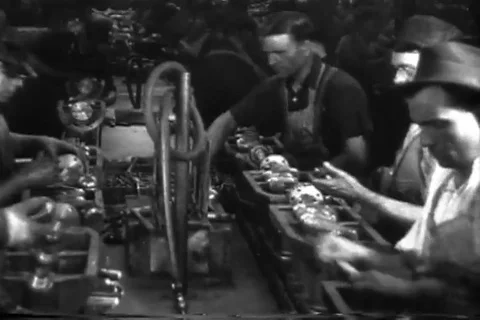 Ford Motor Company Pikers 1920s - Factory Workers on Assembly Line Stock Footage 114654113