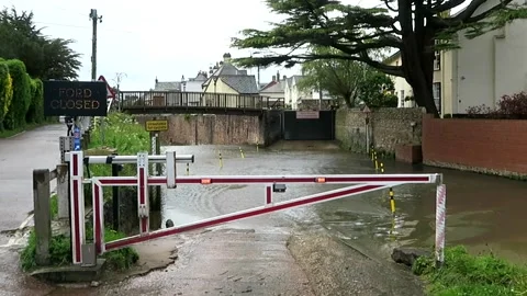 Ford on the River Sid closed due to flood water Stock Footage 154303006
