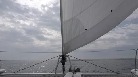 From fore deck centerline of yacht looking forward with jib under full sail u Video stock 67889672