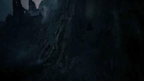 Foreboding chasm surrounded by towering jagged rocks and gloomy ambiance Stock Footage 333555407
