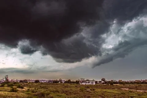 Foreboding Skies: Dark Clouds Before the Rain Stock Photos