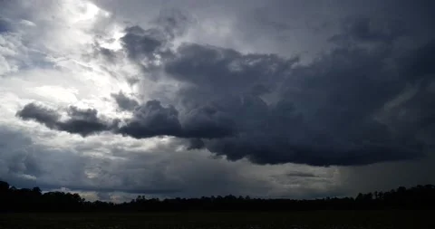 Foreboding sky, time lapse, confused, multiple cloud layers, silver/gray sunset Stock Footage 152525192