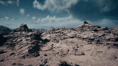Foreboding terrain of fractured stone and swirling dust storms Stock Footage 331523197