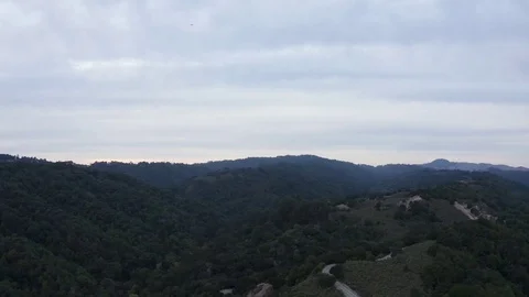 Foreboding weather over the river and forest. 動画素材 118496684