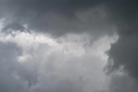 Foreboding weather scene with textured clouds and diffused light. Intense s.. Stock Photos