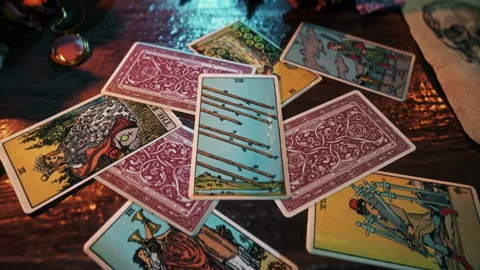 Forecasting mystic change in the magic Eight Of Wands card reading seance Stock Footage 250782742