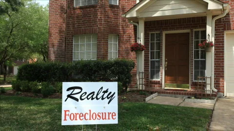 Foreclosure sign on house Stock Footage 687407