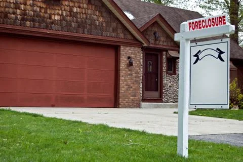 Foreclosure sign in yard Stock Photos