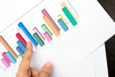 Forefinger for explain sheet graph and chart for report work Stock Photos