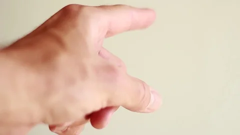 Forefinger pointing forward closeup Vídeos de archivo 75048764