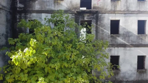 Foreground of an abandoned building. PANIOUS VIEW. aerial view, drone photo.. Stock Footage 303773329