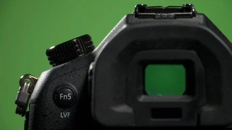 Foreground camera shoots green screen clous up Stock Footage 99549410