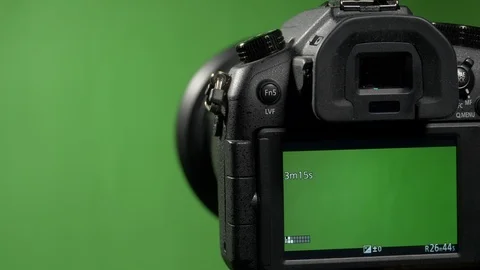 Foreground camera shoots green screen clous up Stock Footage 99549733