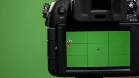 Foreground camera shoots green screen clous up Stock Footage 99549867