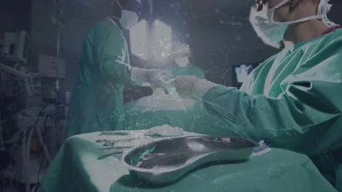 Foreground surgeon receiving, inspecting forceps following request, managing Stock Footage 334728935