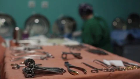In the foreground of the surgical tools on the table. ready for surgery Stock Footage 70808128