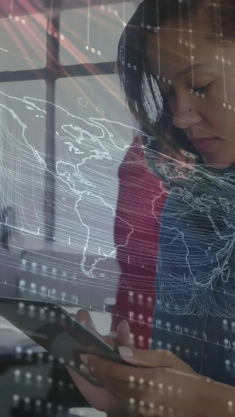 Foreground woman scrolling tablet, activating animated world-map and data lines Stock Footage 330982400