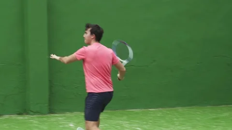 Forehand and backhand hits during tennis game between two male players Stock Footage 172325831