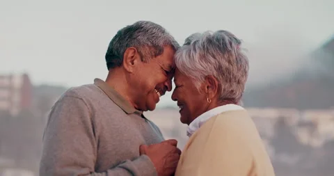 Forehead, beach and old couple with love, hug and romance with marriage and Stock Footage 265139695