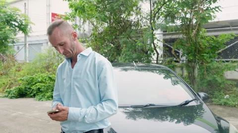 Foreign man with annoyed face, talking angrily, picking up cell phone call Stock Footage 295781972